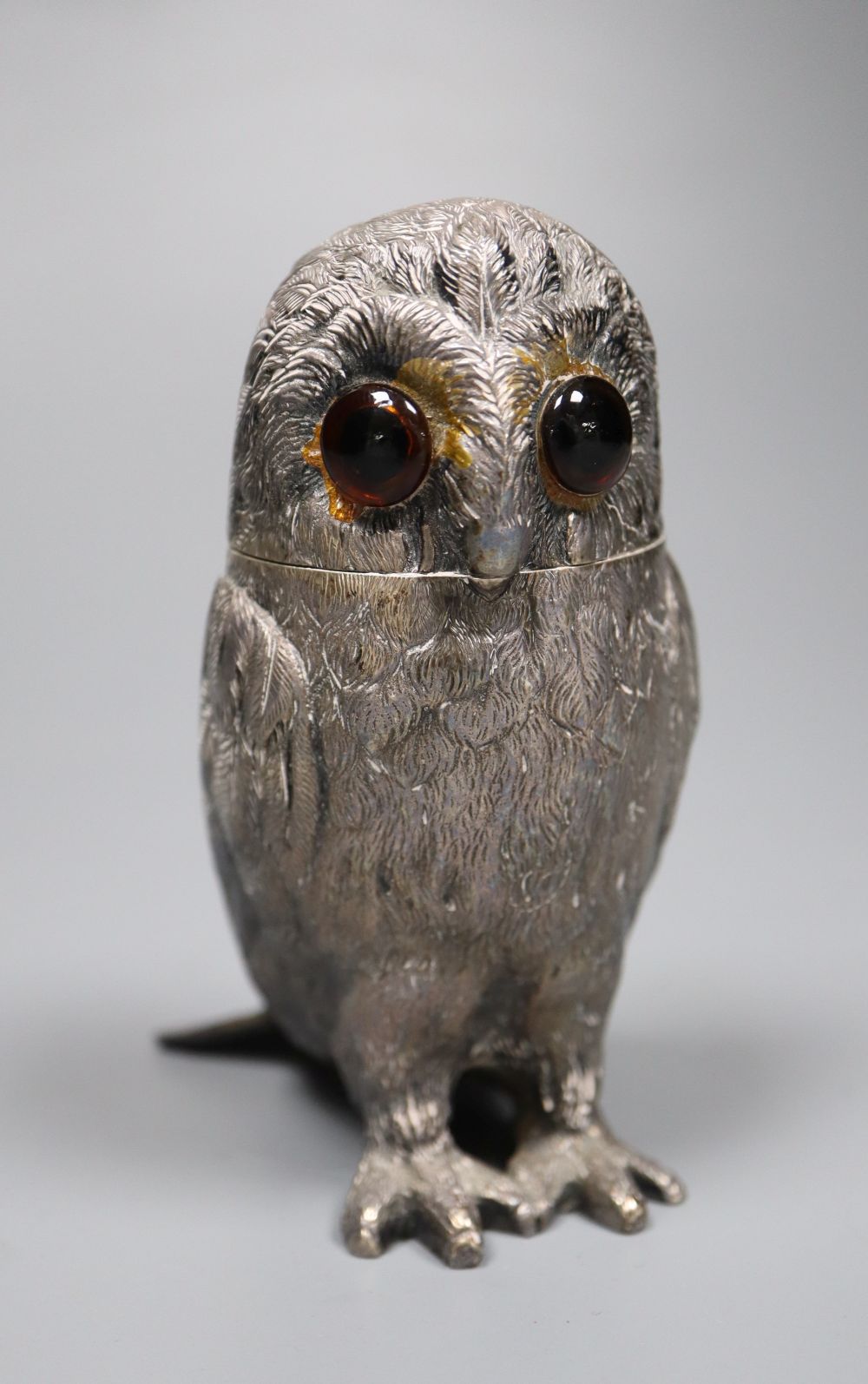 A 1970s novelty silver pepperette, modelled an owl with glass eyes, Edward Barnard & Sons Ltd, London, 1972, 11.3cm,